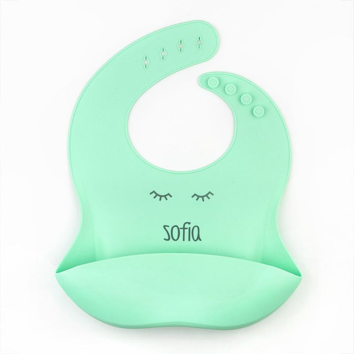 Babero SILICONA Personalizado Nombre + Pestañas, color a elegir - Mikeko
