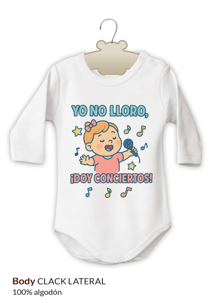 Body blanco para niña con estampado colorido de bebé rubio y texto "Yo no lloro, ¡doy conciertos!".