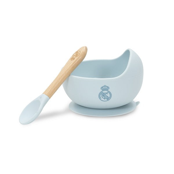 Set cuenco azul de silicona con base antideslizante y cuchara con mango de madera y punta de silicona, logo Real Madrid.