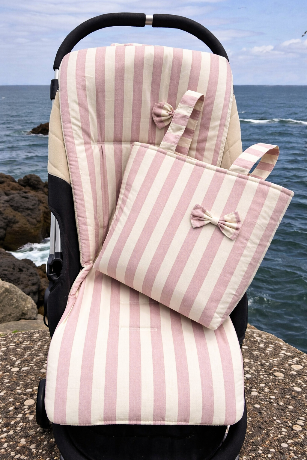 Set colchoneta + bolso rayas rosa para carrito de bebé